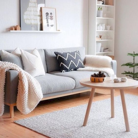 Use bi rug for the living room.