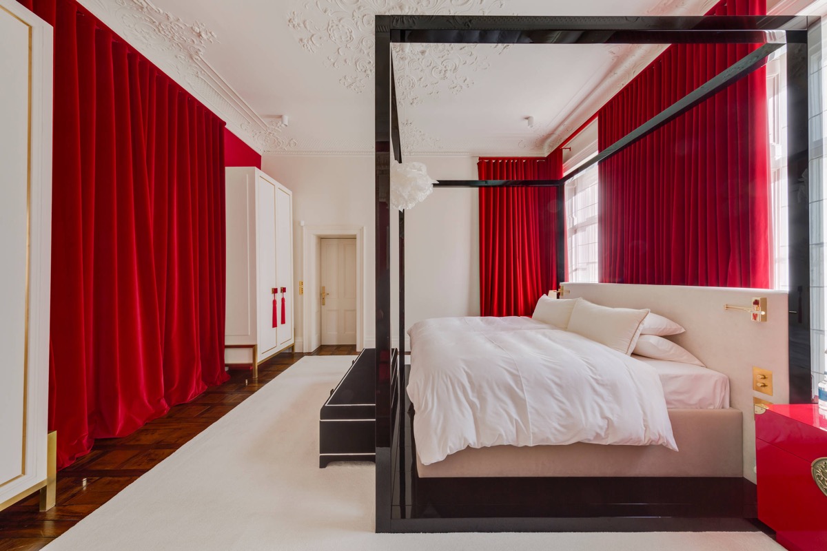 Bedroom with Elegant Red Curtain
