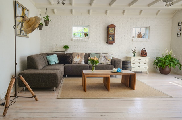 a living room with a mixture of traditional and modern design elements