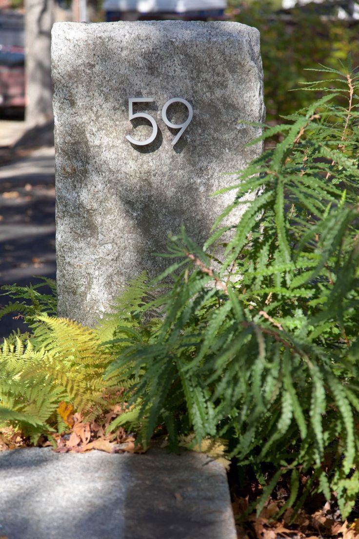 Low House Number Sign on Stone