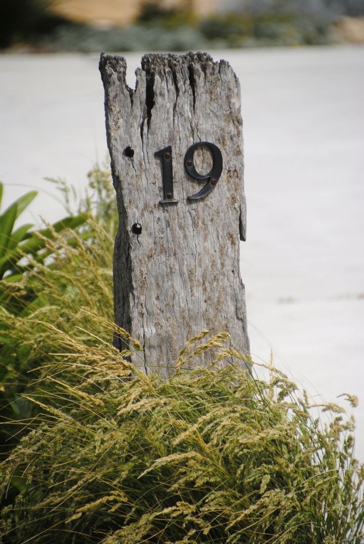 Beach House Number Using Wood from An Old Pier